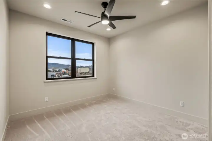 Fourth bedroom facing south with mountain views
