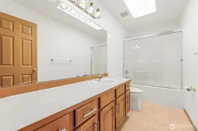 Fully bathroom with sliding door shower