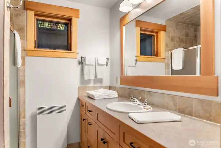 3/4 Bath has ceramic tile floor. Heated. Shower.