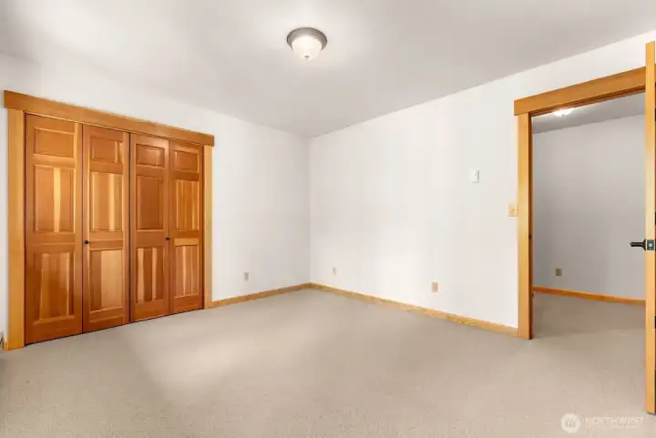 Bedroom 3, white wool carpet with wool pad is a well appointed feature to enjoy for many years.