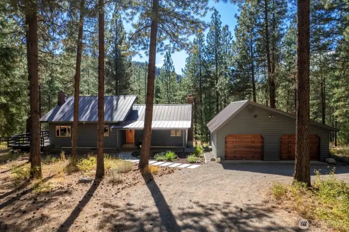 Twisp River Valley offers a perfect Mountain retreat home. 1,456 SF main level & 1456 SF, Fully finished daylight walk-out Basement living area for this 4 bedroom / 3 Bath home. A splendid quiet beauty on 5 well tended acres, bordering Forest land on 3 sides.