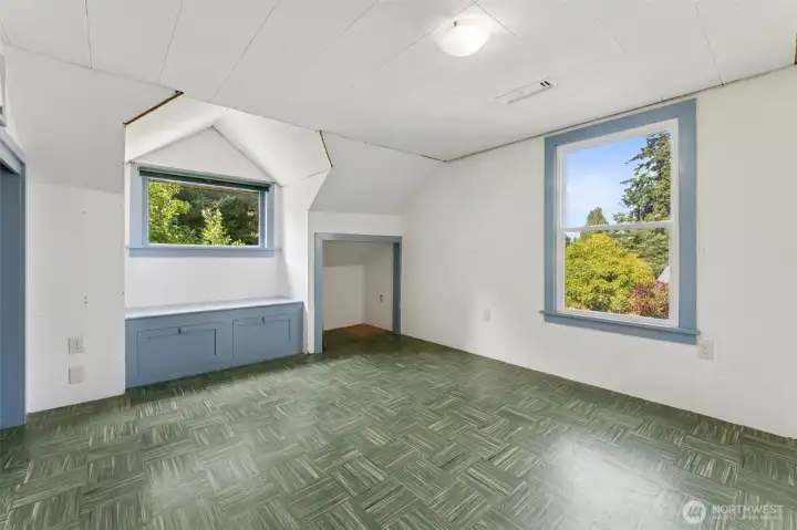 Upper Bedroom #3 with cute built ins and dormer.