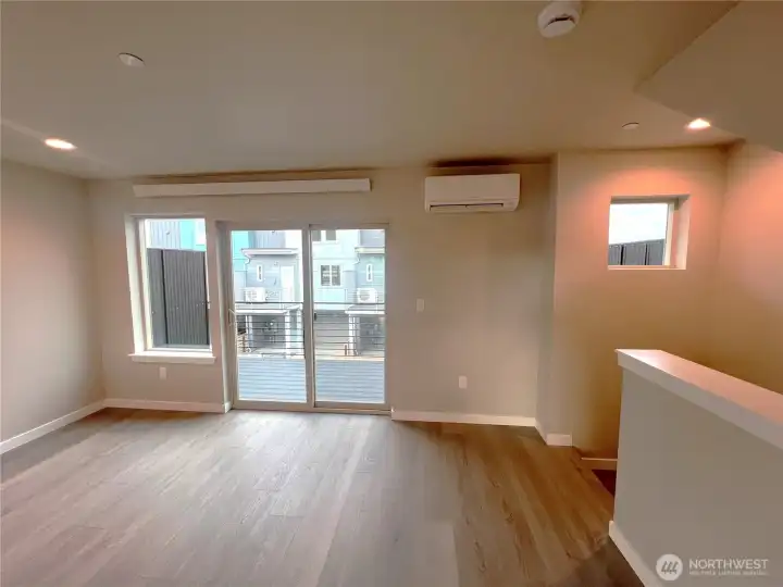 Living area looking out to spacious deck
