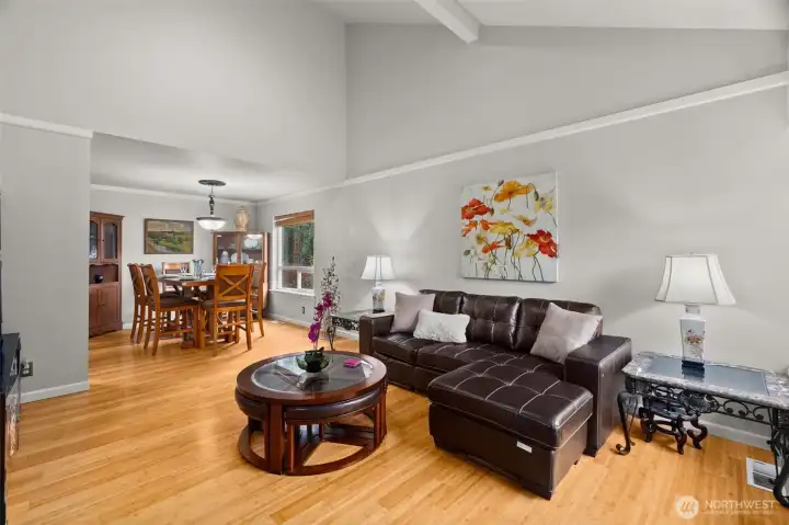 Vaulted ceilings with open beam accent. Room feels large.