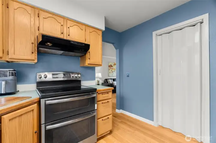 Pantry area behind door.