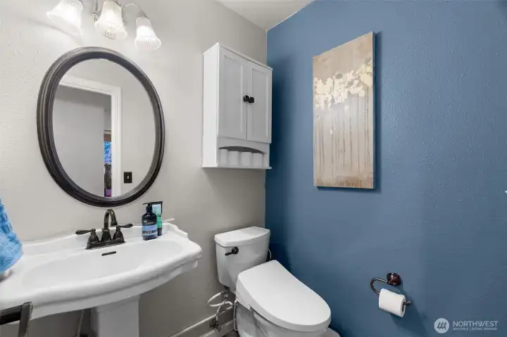 Downstairs bathroom with bidet.