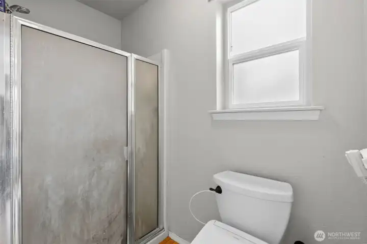 Primary bathroom shower.