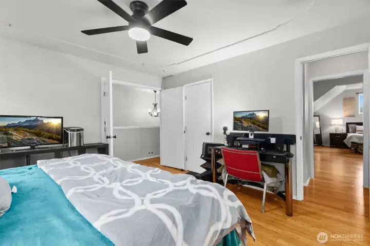 Upstairs bedroom with adjoining five piece bath. Has French doors and walk way over to bonus room with more closet space.