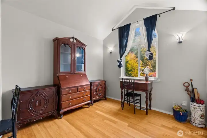 This is the third bedroom upstairs with vaulted ceilings.