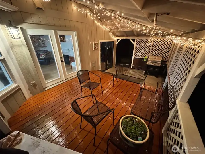 Back patio is enclosed and has raised deck. Perfect for those NW evenings .