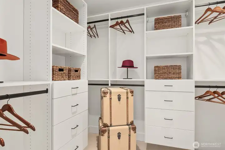 Large walk in closet with built in closet system