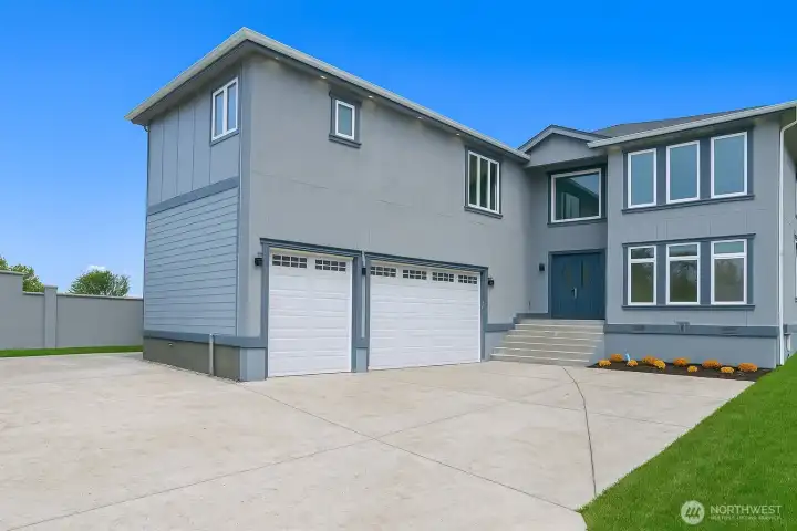 Home features exterior stucco, 3 car garage, a huge driveway, and situated next to similar style homes in the neighborhood!