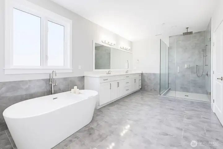 Master Bath with walk-in shower, two sinks and a tub with great tile work!