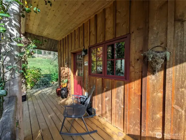 This covered porch wraps around to a great deck for long summer dinners and wintertime stargazing.