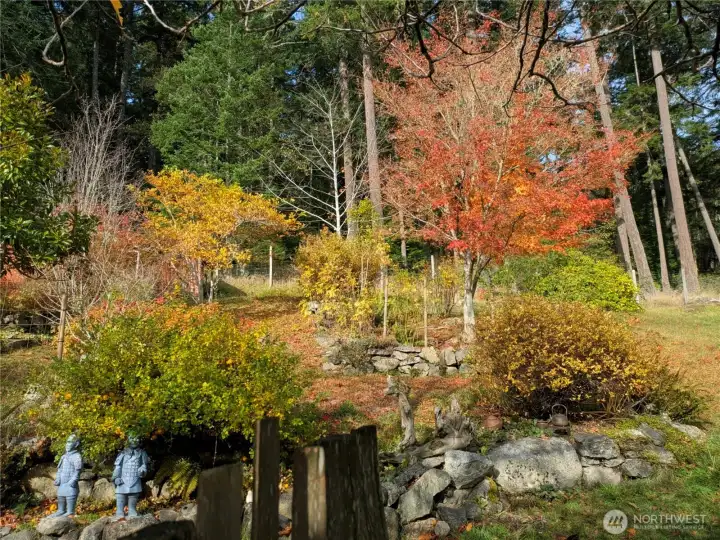 Thoughtfully planned terraces with gorgeous stones make this garden area easy to explore and enjoy.