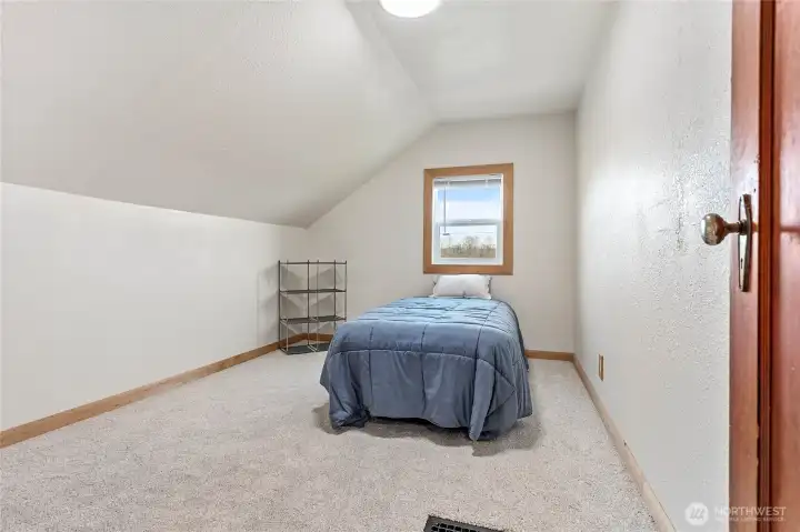 2nd bedroom upstairs with new carpet, and  a beautiful view of Mt. Baker