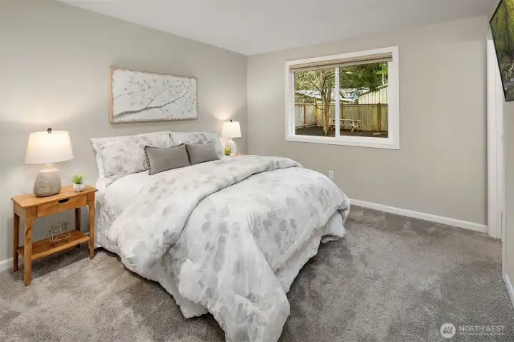 Primary Bedroom Overlooking Tranquil Backyard