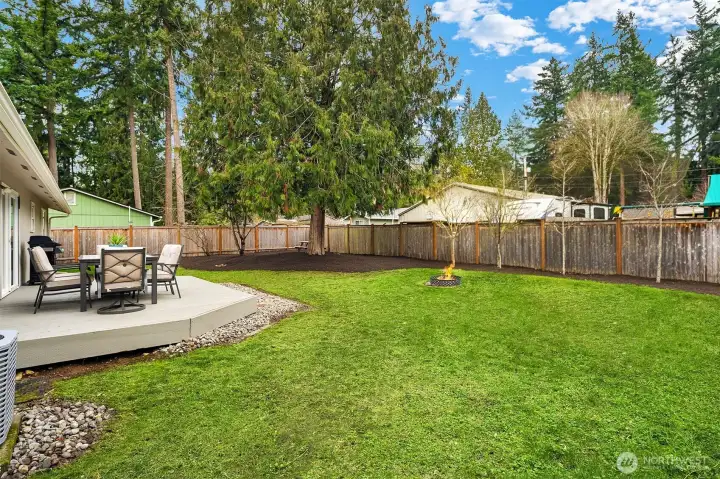 Large Flat Backyard with Fire Pit Area