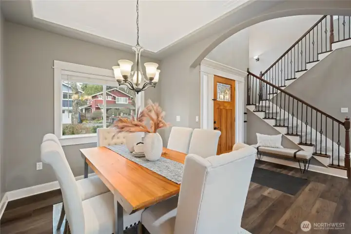 This large dining room welcomes you from the front door and has views to the front of the home.