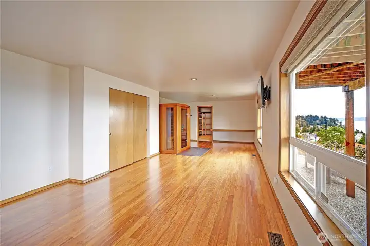 The studio/gym with sauna, woodstove and massive storage area!