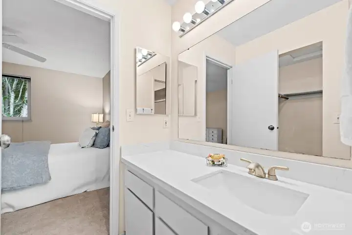 Primary suite vanity with new quartz countertops