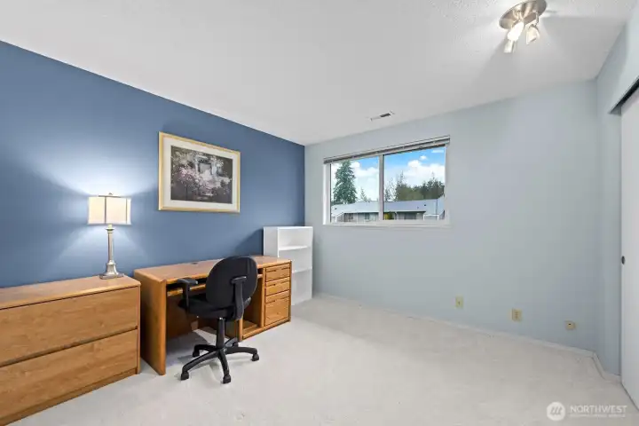 Bedroom two, large and overlooking the greenbelt.