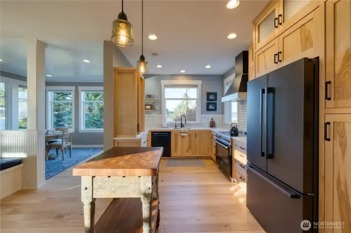 Pantry cabinets for storage and butcher block for prep.