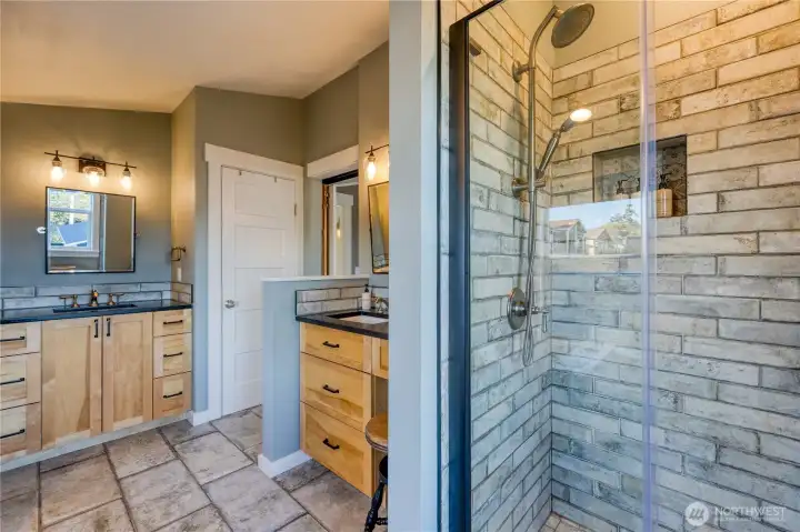 Primary bath has double sinks, linen closet as well as soaker tub, separate shower and in floor heat!
