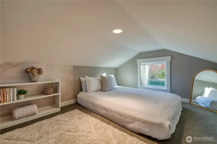 Upstairs loft bed for guests...this area is accessed by a ladder.