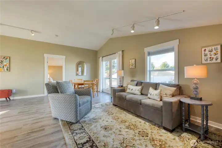 Cozy living area with vaulted ceilings.