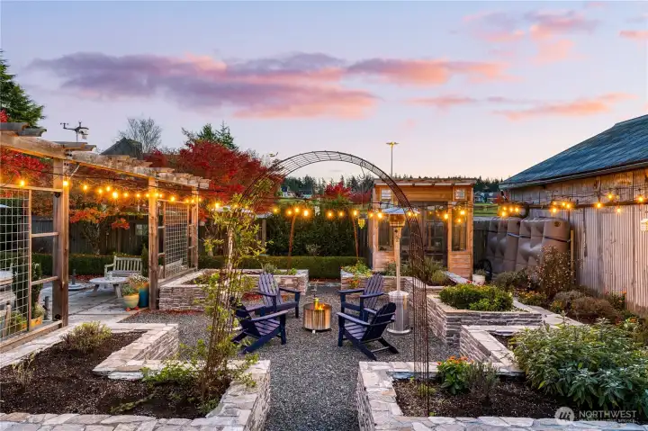 Let's not forget the outdoor living areas.  The property is surrounded by a privacy hedge which allows the yard to feel like it is not downtown!