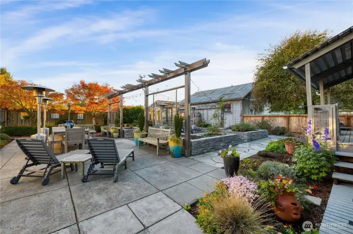 Arbors, paved areas, beautifully planted with color for three seasons!