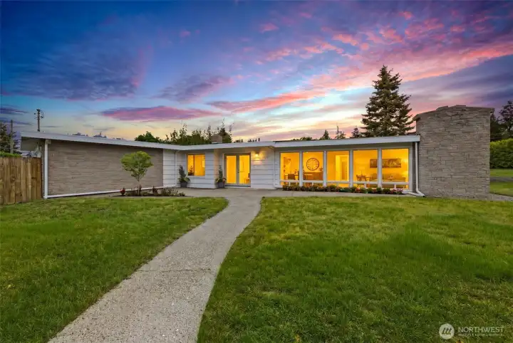 A special mid-century rambler on a very private lot.