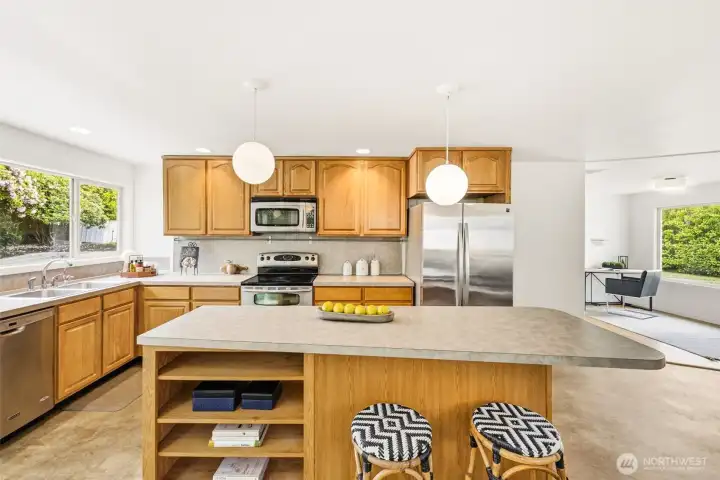 Large kitchen island with added space for storage.