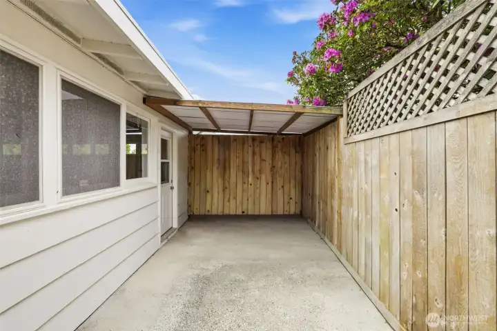 Nice covered area for additional and protected storage.