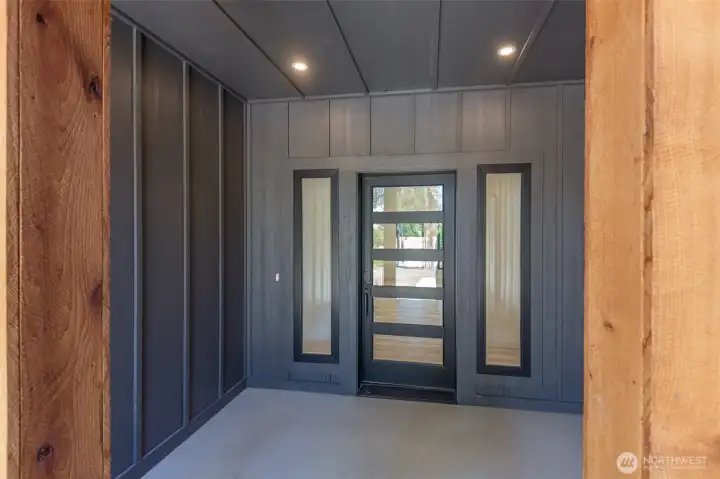 Beautiful front door with sidelignts