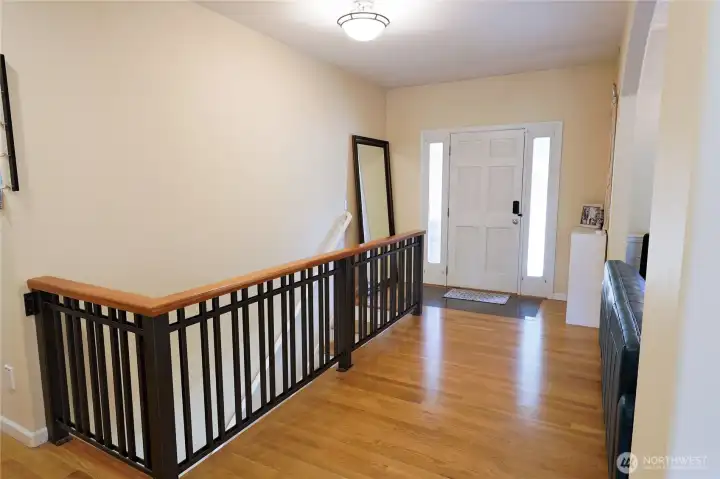 A welcoming entryway sets the tone for the home, with rich wood flooring and an abundance of natural light. A welcoming entryway sets the tone for the home, with rich wood flooring and an abundance of natural light.