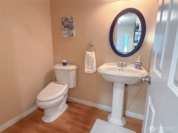 A convenient half bath on the main floor adds everyday function for guests and family alike. A convenient half bath on the main floor adds everyday function for guests and family alike.