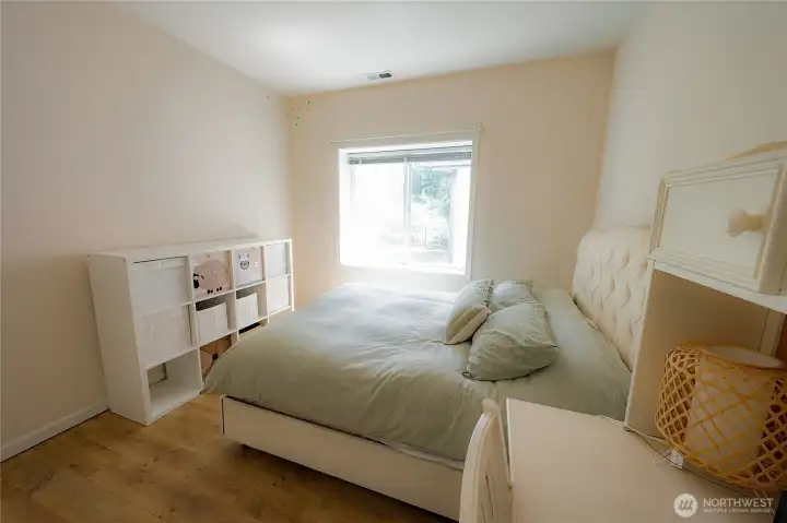 This lower-level bedroom adds even more flexibility, ideal as a guest room, playroom, or office. This lower-level bedroom adds even more flexibility, ideal as a guest room, playroom, or office.