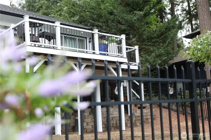 Both a lovely composite deck and a covered patio offer inviting outdoor spaces. Both a lovely composite deck and a covered patio offer inviting outdoor spaces.