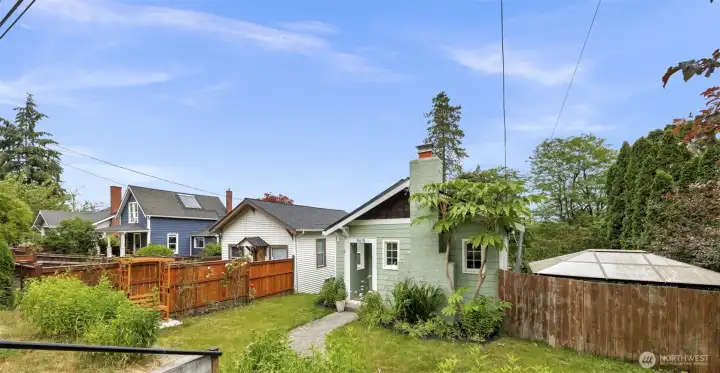 Big lot with fenced yard, garden areas,