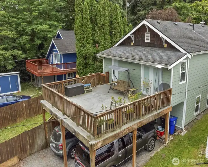 Large entertainment size deck in back and covered carport parking too.