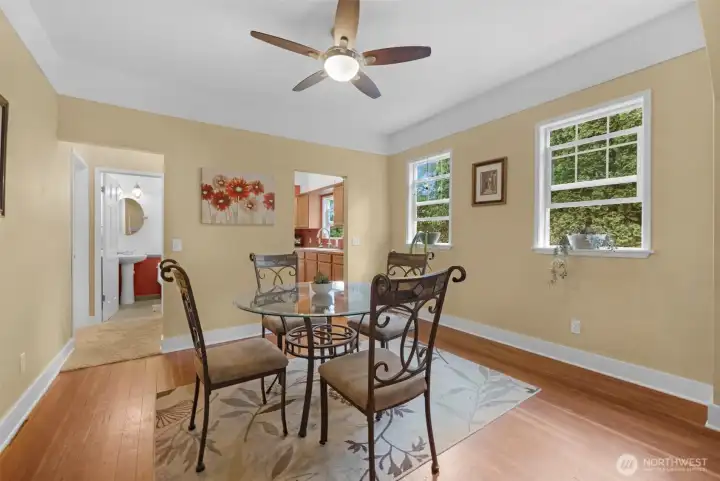 Large dining room with plenty of room for hutch or cabinets.