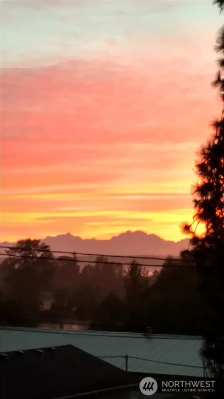The sun rise is beautiful from the Primary bedroom as well.
