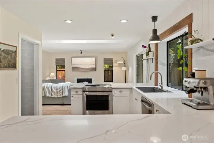 Easy access to the backyard from the kitchen and living room. Easy access to the backyard from the kitchen and living room.