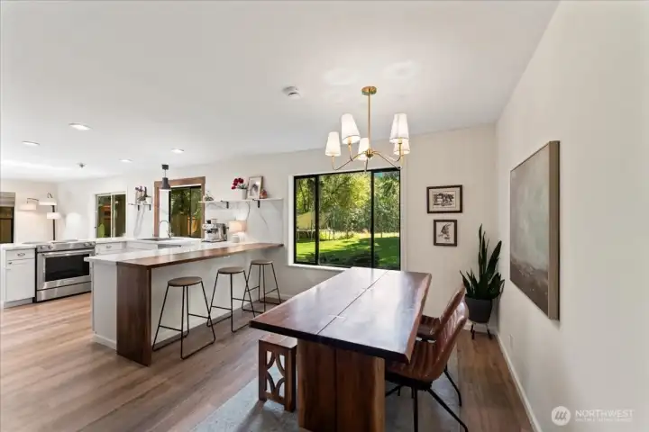 Gather with family and friends in this inviting dining room featuring a beautiful new brushed gold chandelier and ample space for large-scale dining. Gather with family and friends in this inviting dining room featuring a beautiful new brushed gold chandelier and ample space for large-scale dining.