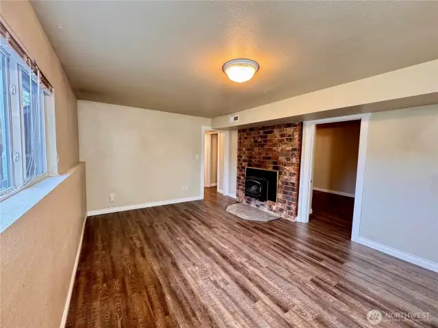 Downstairs family room with wood burning wood stove.