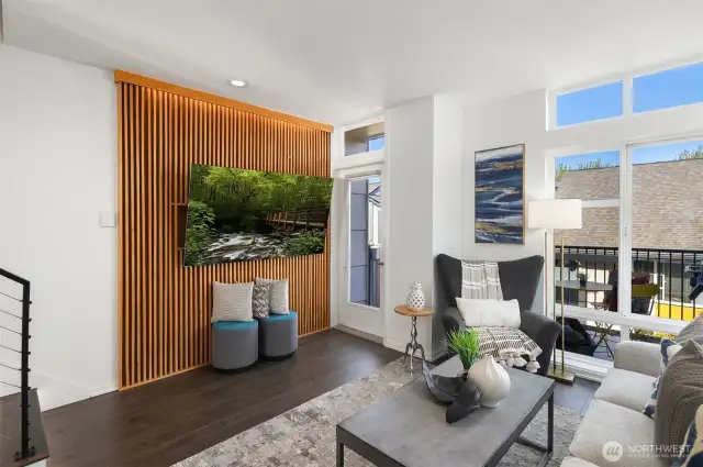 Living room features custom-made Japandi feature wall with custom hue lighting. The patio is spacious—large enough for a BBQ, table, and chairs.