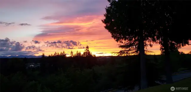 Sunset over the Olympics from your unit deck.