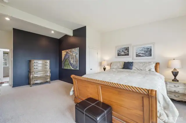 The spacious primary bathroom is complete with views, deck access, ensuite and walk-in closet.